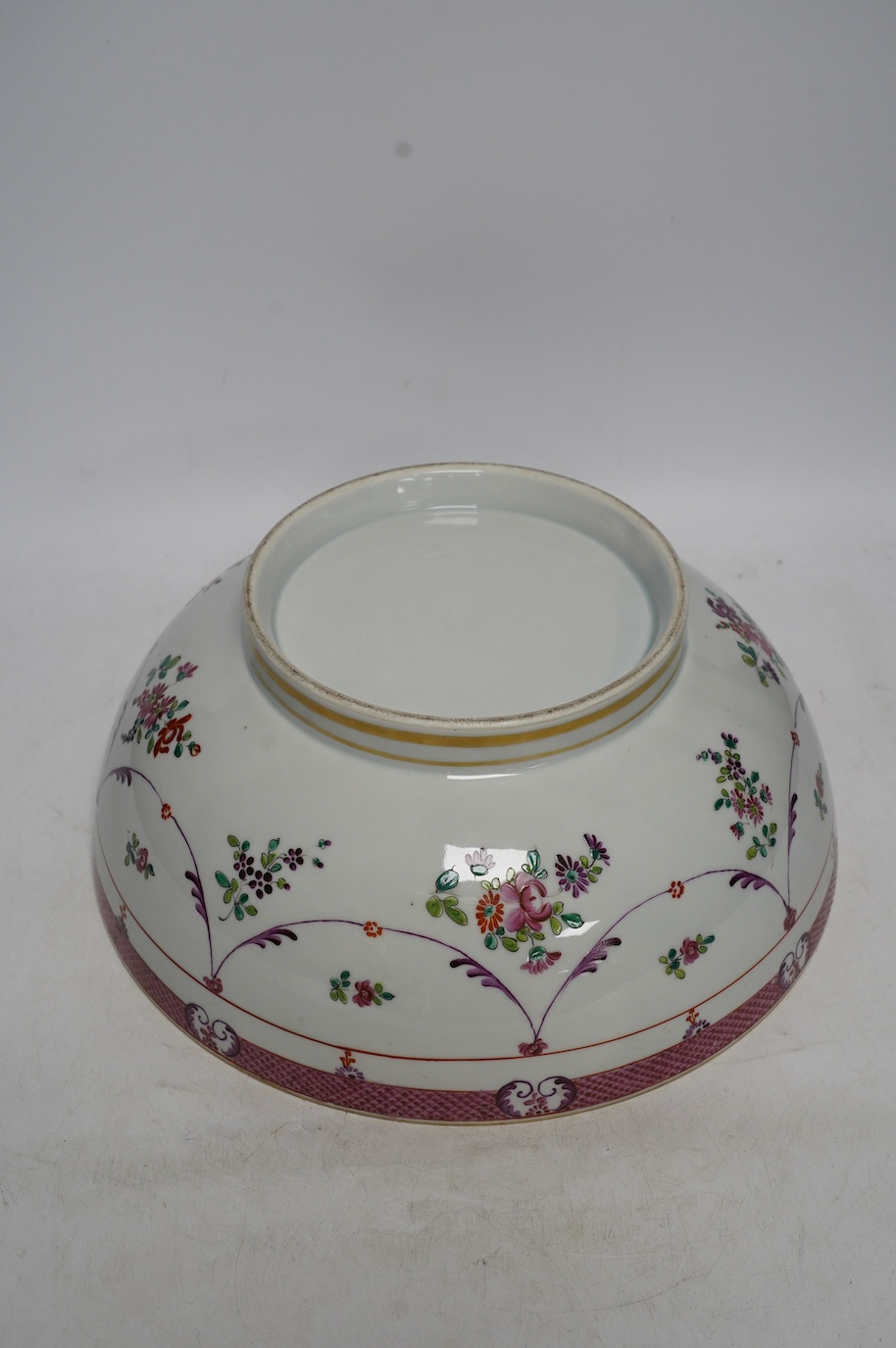 A 19th century Samson famille rose bowl, 32cm diameter. Condition - slight wear to gilding